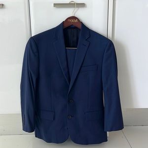 Ryan Seacrest suit and pants with cover